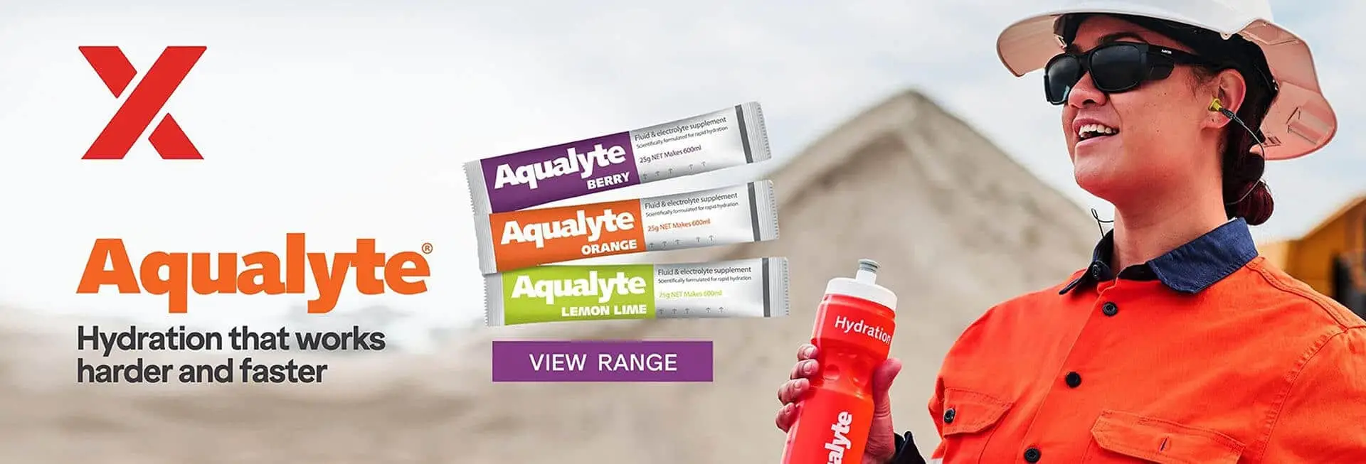 Three packets of Aqualyte electrolyte drink mix in Berry, Orange, and Lemon Lime flavors, with a red water bottle in the background and the text 'VIEW RANGE' at the bottom.