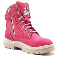 Bright pink women's ankle boot with laces and a decorative side zipper, padded collar, logo patch on the tongue, and a thick beige treaded sole.
