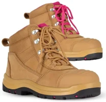 Tan work boots with pink laces — pair of mid-ankle, lace-up safety boots with reinforced toe caps and black treaded soles.