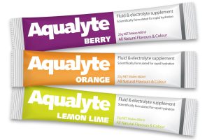 Oral rehydration salt sachets in orange, berry, and lemon flavors, packed in slim rectangular packets