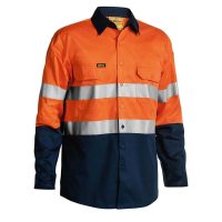 An orange long-sleeve work shirt with navy blue accents, including two reflective stripes across the chest and arms, designed for high visibility in work environments.