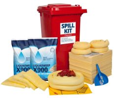 A large spill response kit featuring a red wheeled bin labeled "SPILL KIT." It includes yellow absorbent pads, several absorbent socks, and blue bags of loose absorbent material.