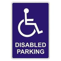 Image of a blue sign with a wheelchair symbol and the text "DISABLED PARKING" indicating a parking space reserved for individuals with disabilities.