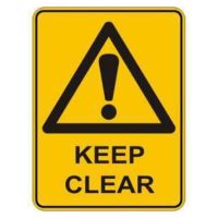 A warning sign with a yellow background, featuring a black triangle with an exclamation mark inside, accompanied by the text "KEEP CLEAR" at the bottom.